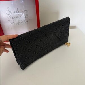 CHANEL Black Quilted lambskin Clutch authentic